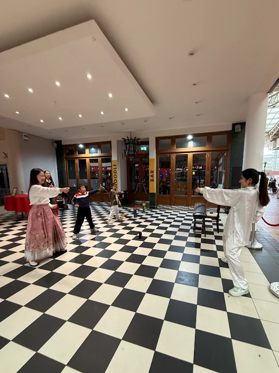 Tutors demonstrate Baduan Jin exercises