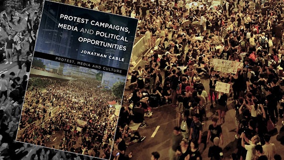 A book cover showing a protest
