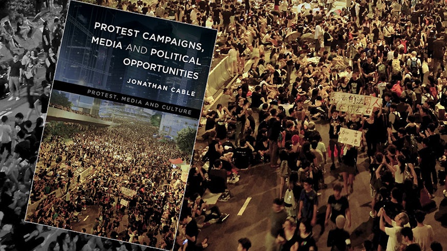 A book cover showing a protest