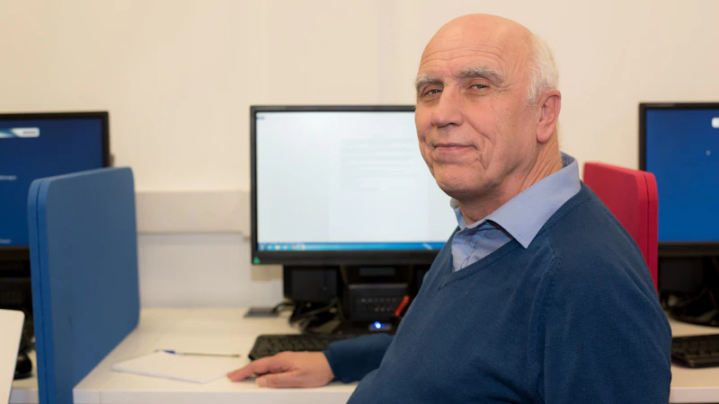 Man in front of a computer