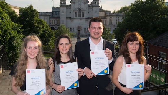 Student celebrate with their Cardiff Awards