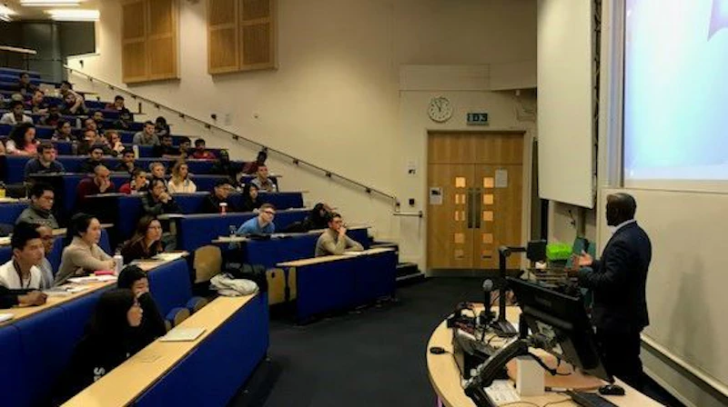 Buchi Onwugbonu talking to MBA students