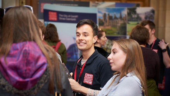 Student meeting visitors at Open Day
