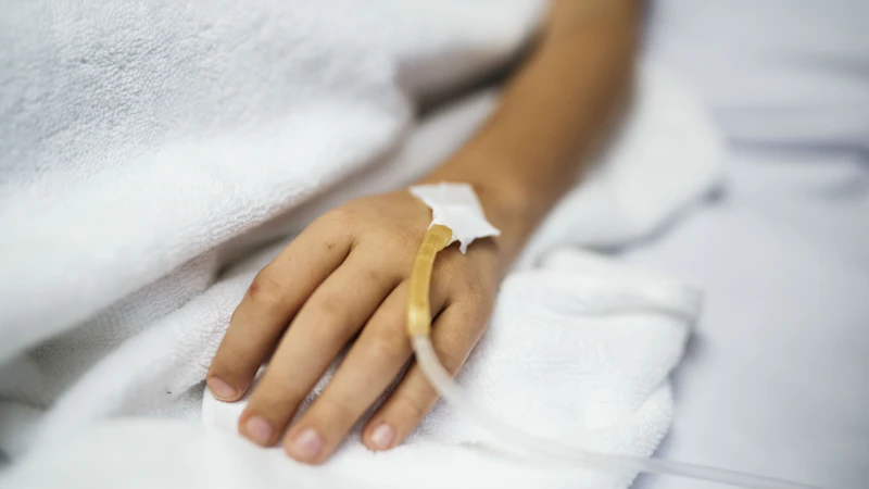 An arm with an IV