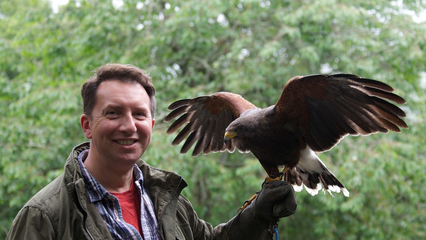 Dr Rhys Jones with an eagle