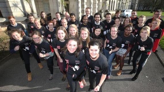 Members of Team Cardiff in their black running shirts