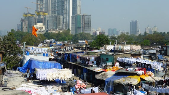The public realm weaves the city together through interconnected spatial networks of public spaces that interface with the private realm, as here in Mumbai, India