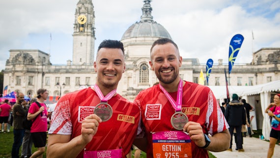 Cardiff Half Marathon runners with medals