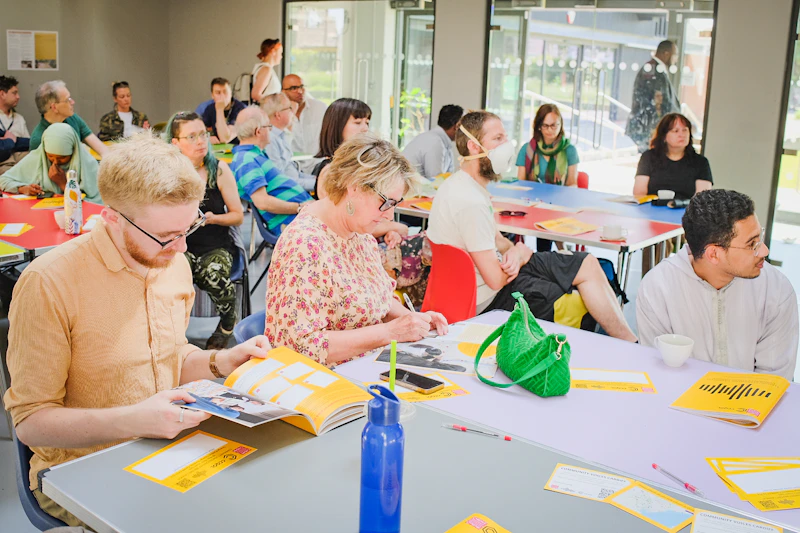 Attendees at launch event for the Community Voices Cardiff report at the Grange Pavilion.