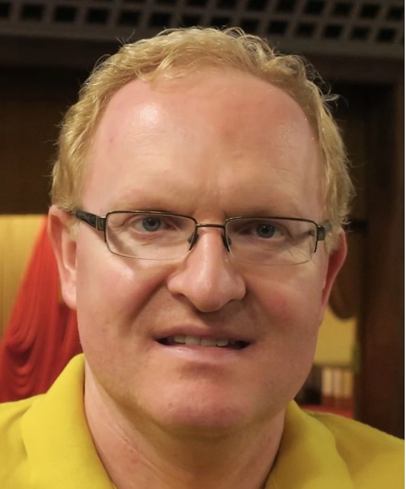 Dr Simon Tew
