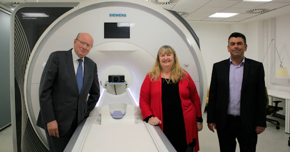 Julie James AM, Professor Derek Jones and Professor Krish Singh with MRI scanner