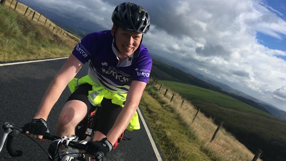 Liam cycling through the Welsh hillside