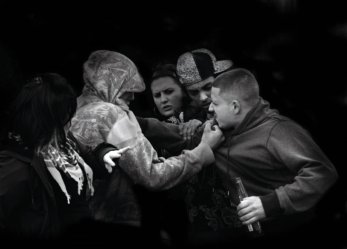 A small group of young people involved in an altercation
