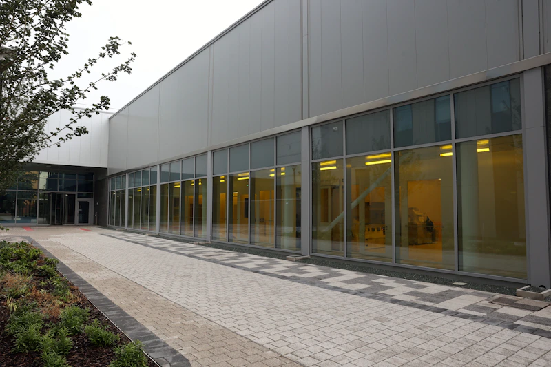 TRH building showing long line of glass windows looking inside