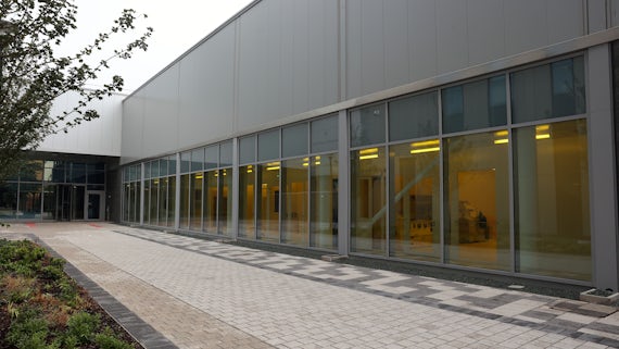 TRH building showing long line of glass windows looking inside