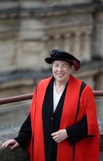 Image of a woman in graduation robes