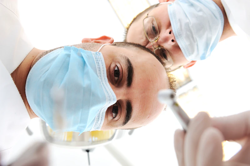 Dentist looking at camera