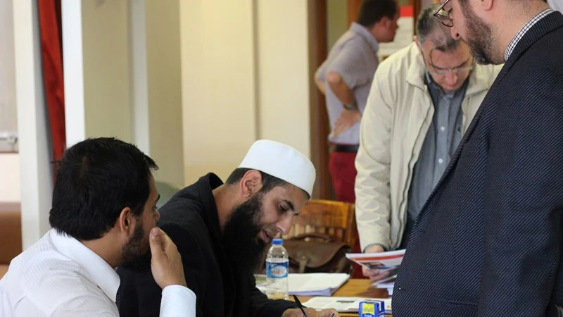 Conference organisers, Riyaz Timol and Abdul-Azim Ahmed, registering delegates at the MBRN / Islam UK conference