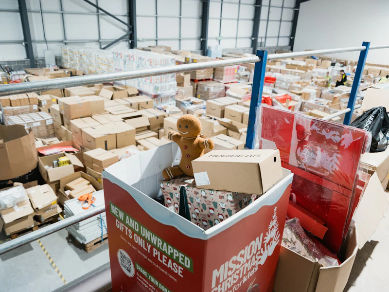 A cardboard box of gifts inside of warehouse.