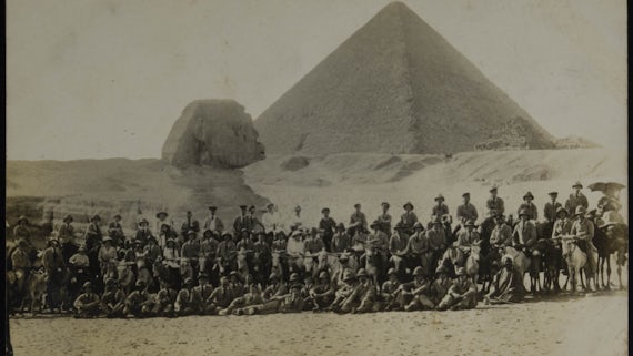 Soldiers in front of the sphinx and pyramid at Giza