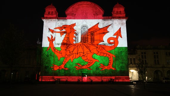 Welsh flag projected onto Main Building