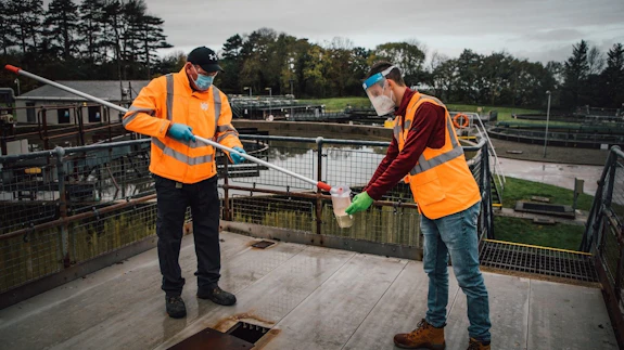 Wastewater samples being collected at Dŵr Cymru Welsh Water treatment works