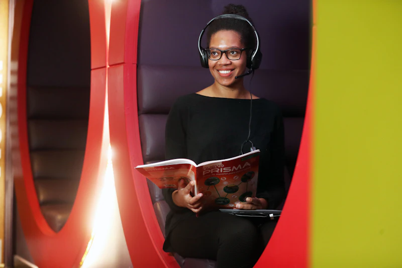 Languages for All student reading book in Students' Union 