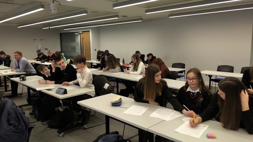 Pupils in year 8/9 in a maths workshop organised by Further Maths Support Programme Wales.