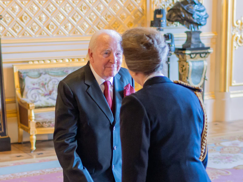 A man receives his MBE