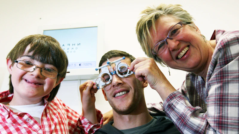 Eye Clinic staff with a Down's syndrome group participant