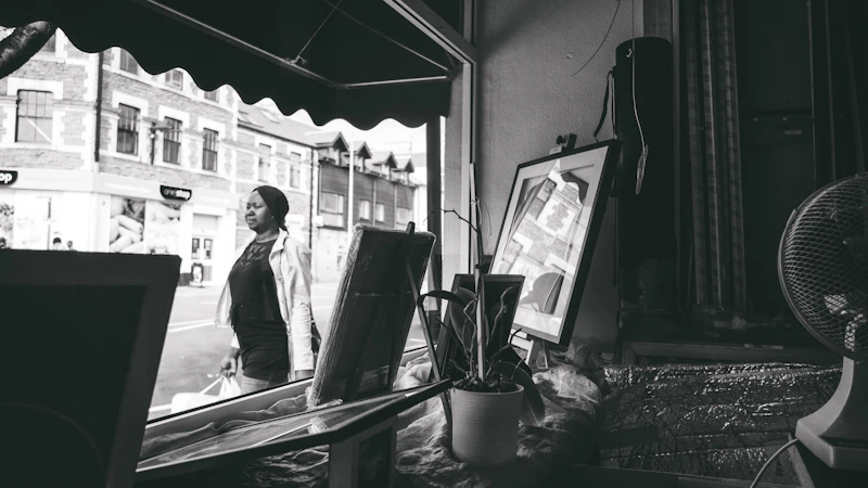 Woman seen through a shop window