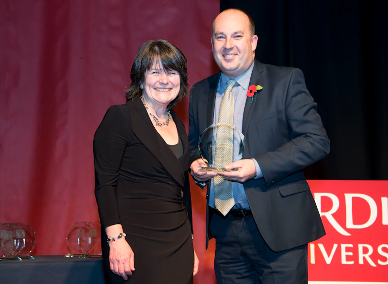 Professor Paul Harper receiving an award