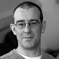 Professor Dominic M Dwyer BSc PhD