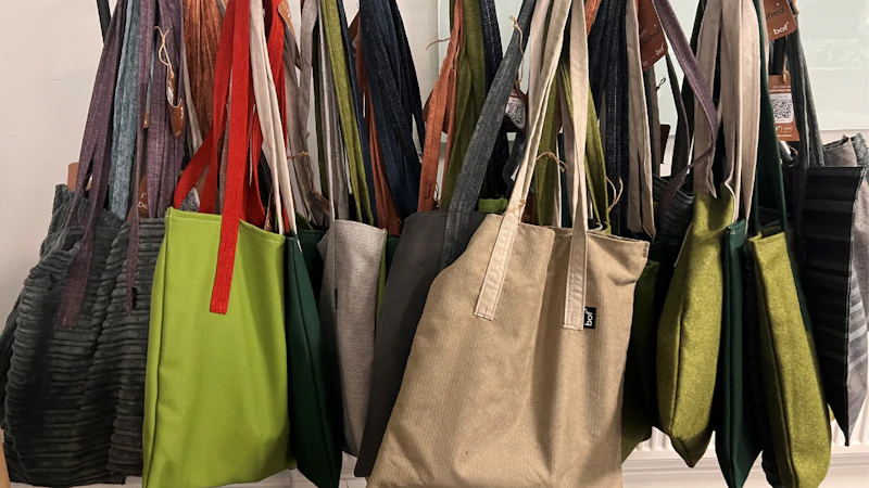 Tote bags hanging up